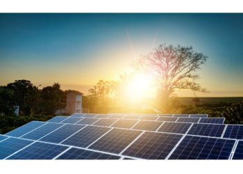 Sunset over Solar energy Farm plant